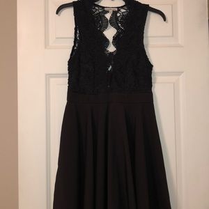 Homecoming dress with laced top and open back
